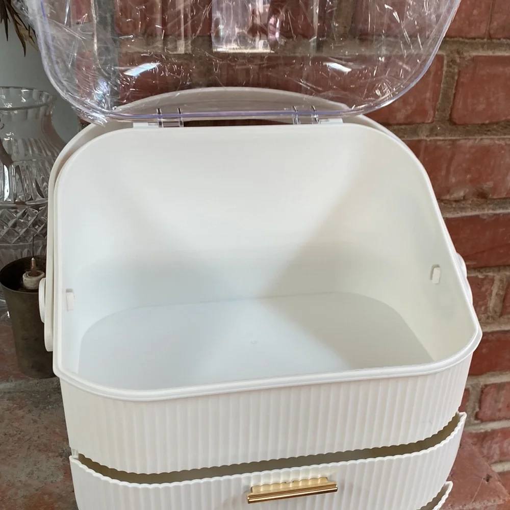 Egg shape makeup organizer case with drawers